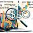 Free SEO report / Audit graphic - magnifying lense over laptop